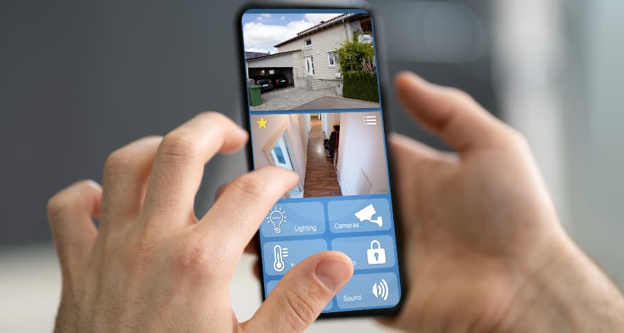 Resident checking video camera footage on a mobile device